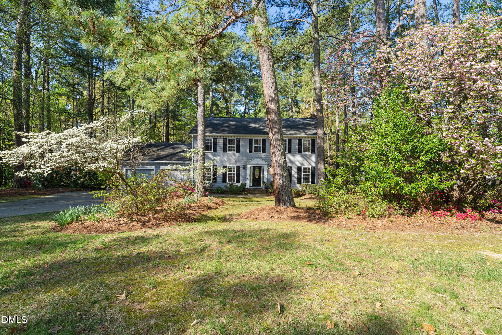 6115 Winthrop Drive Raleigh, NC 27612 - Photo 41 of 41 a view of house with a yard and sitting area