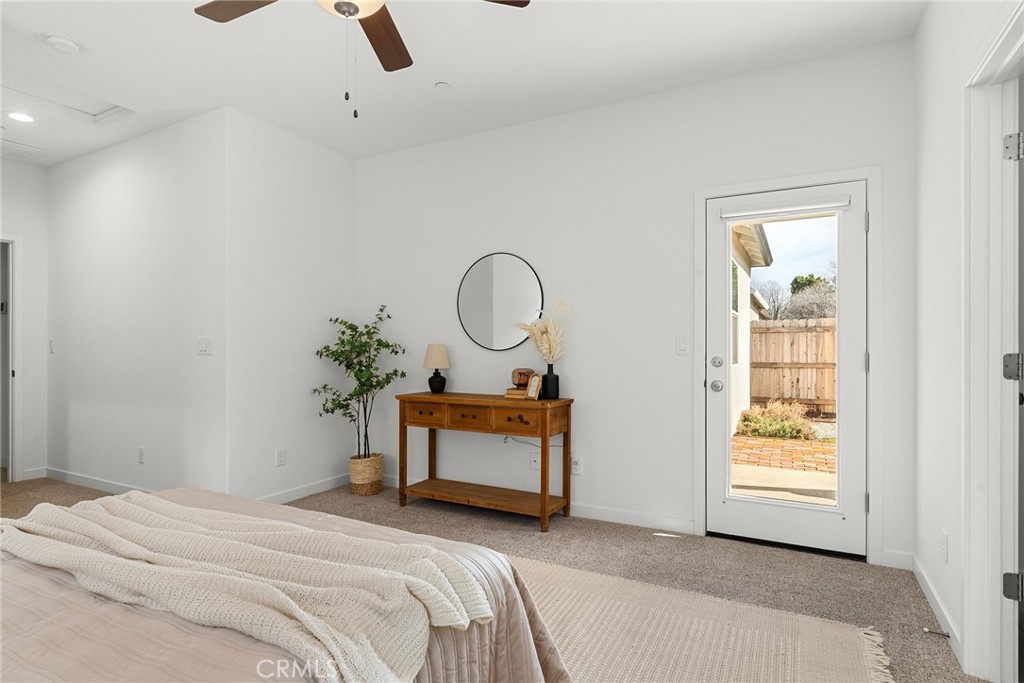 377 Bellamy Terrace Chico, CA 95973 - Photo 18 of 44 Primary bedroom with a door to the back patio!