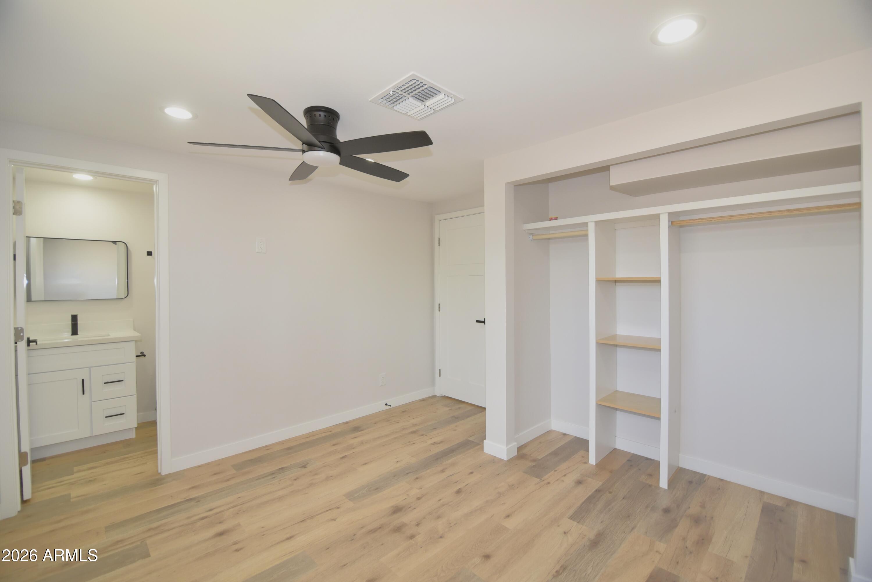 508 South 98th Street Mesa, AZ 85208 - Photo 19 of 34 wooden floor in an empty room