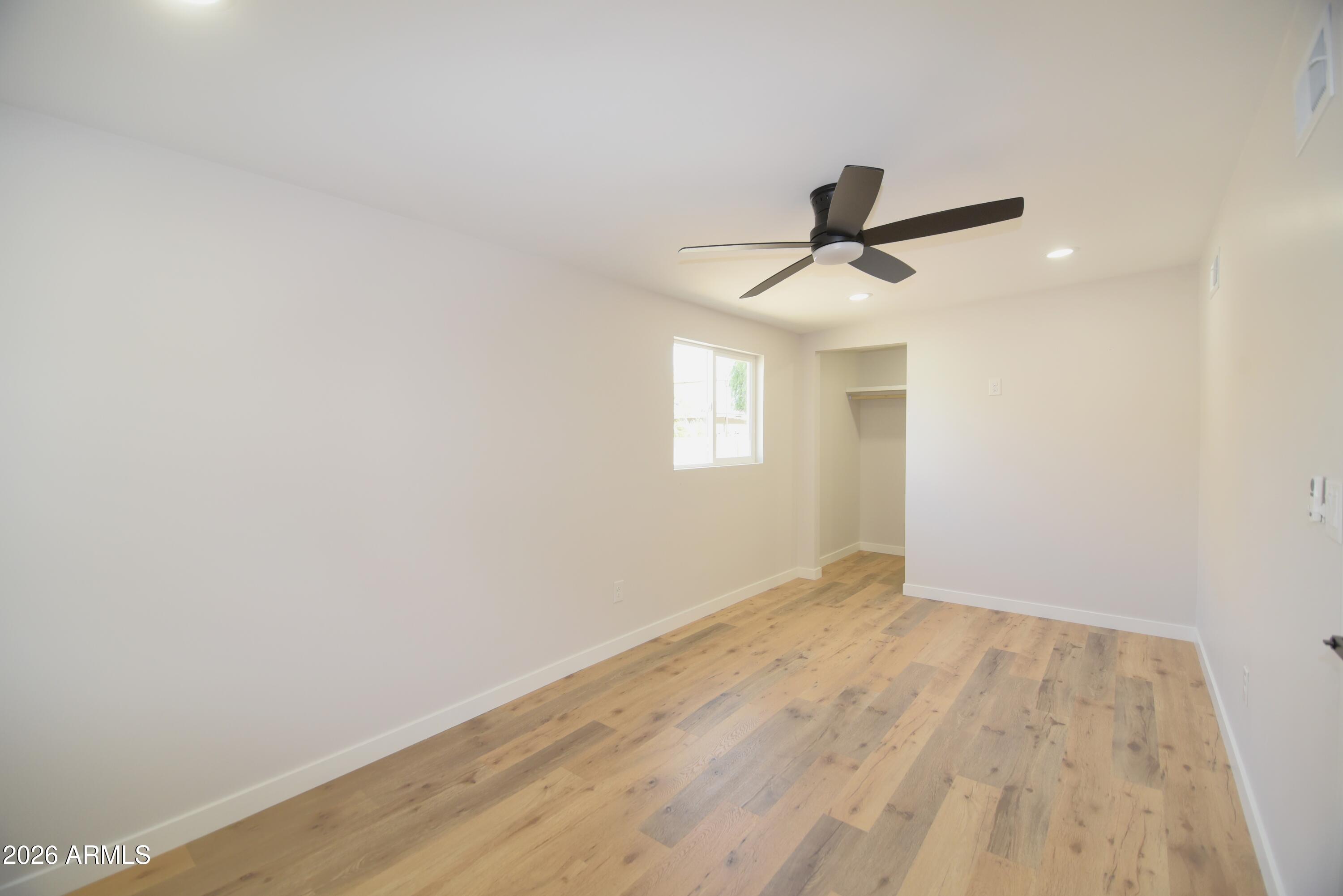 508 South 98th Street Mesa, AZ 85208 - Photo 10 of 34 wooden floor in an empty room
