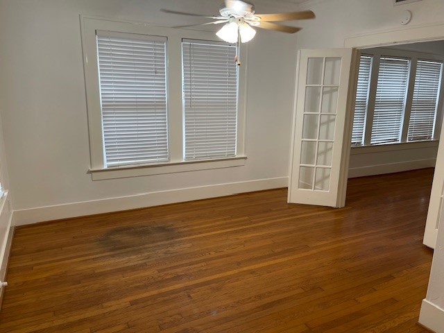 1661 Kipling Street, Unit 2 Houston, TX 77006 - Photo 5 of 10 a view of an empty room with wooden floor and a window