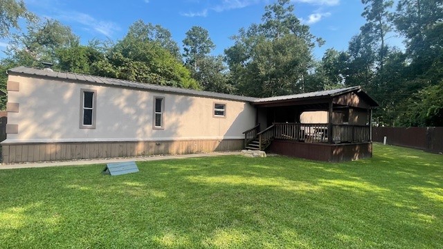 a view of a back yard with a house