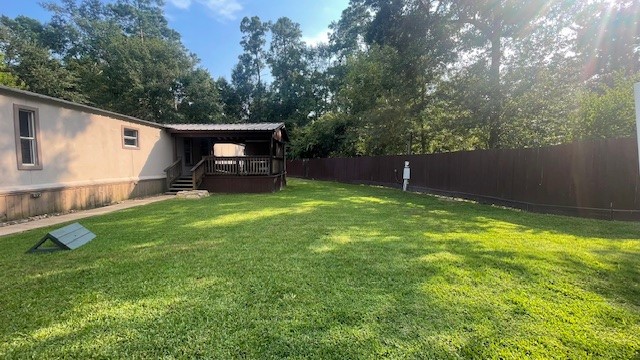 29719 Midland Street Magnolia, TX 77354 - Photo 20 of 21 a backyard of a house with table and chairs