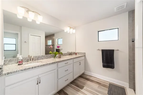 a view of storage and utility room with washer and dryer