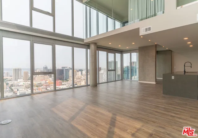 a view of an entryway with a floor