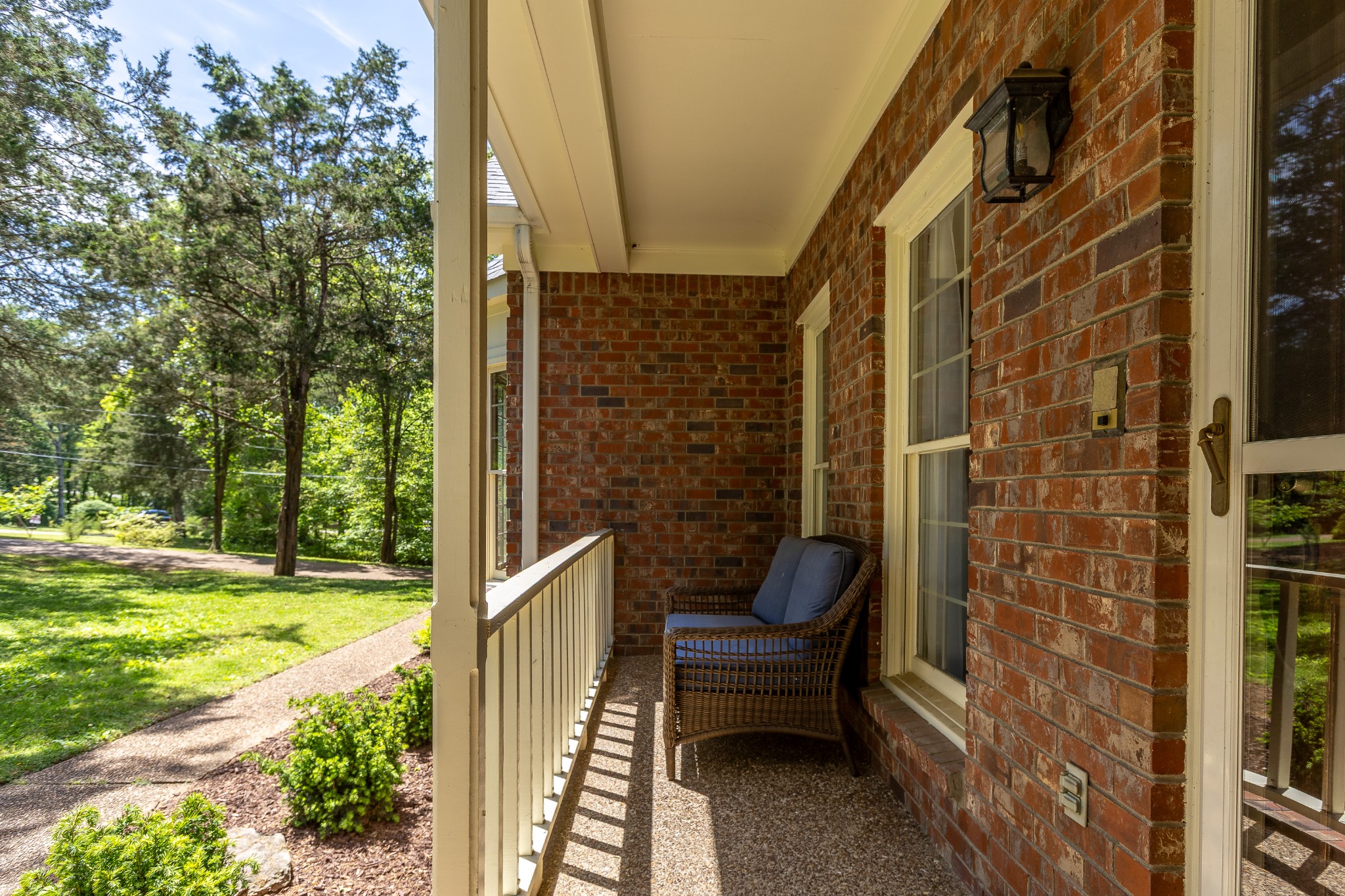 1111 Temple Ridge Court Nashville, TN 37221 - Photo 9 of 46 a view of a porch with chairs and backyard