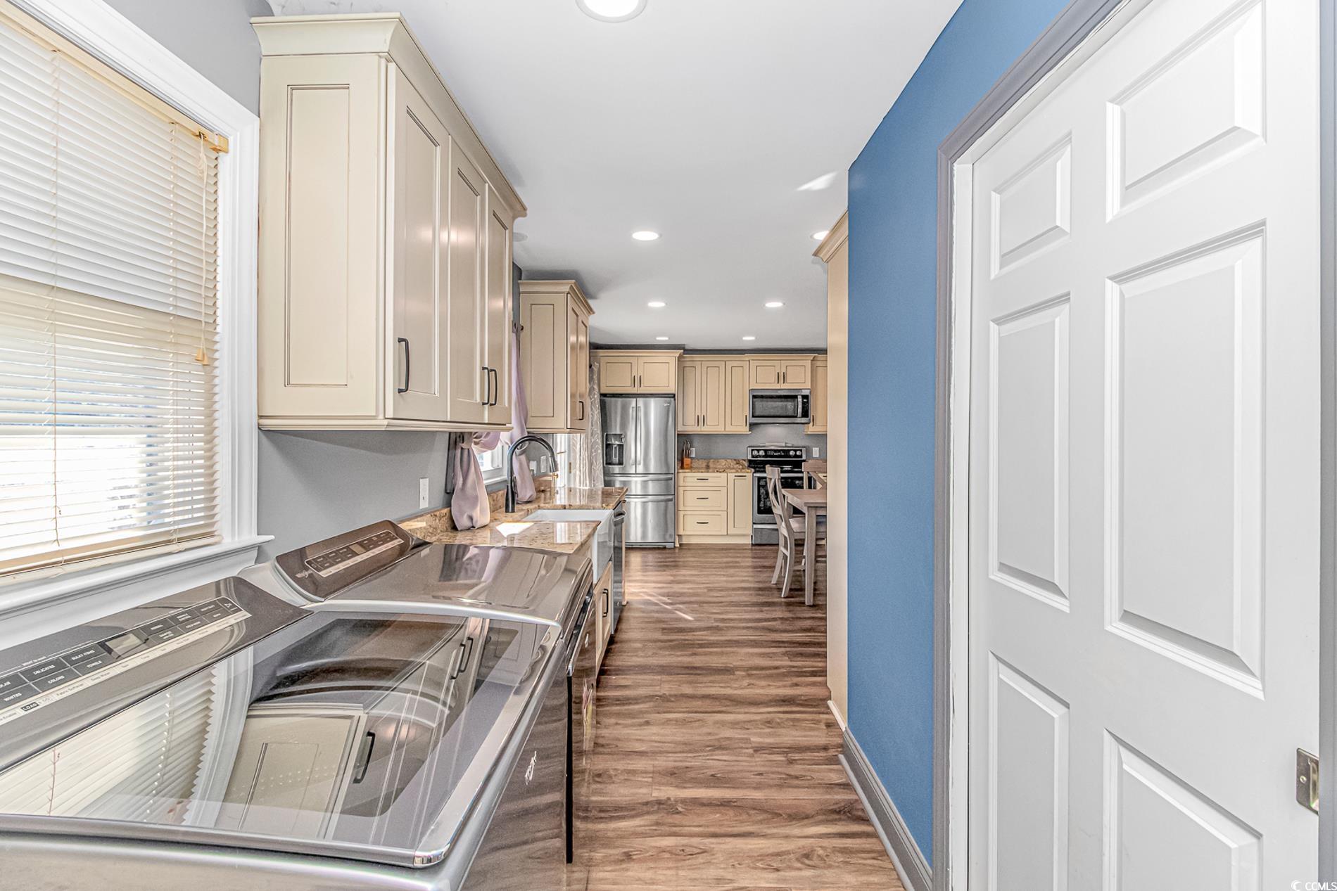 4106 Edwards Road Aynor, SC 29511 - Photo 13 of 39 Kitchen with sink, light brown cabinets, dark hard