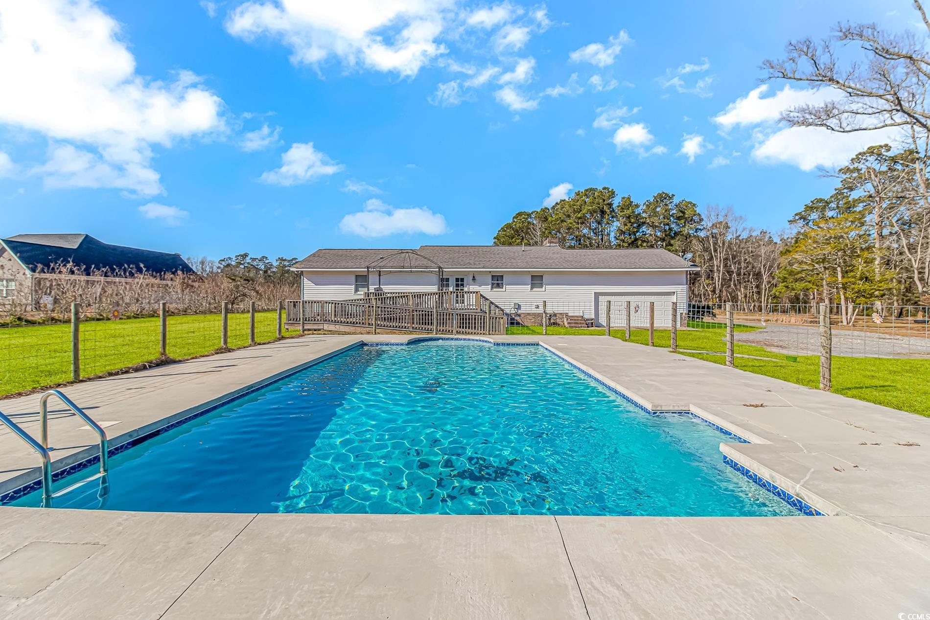 4106 Edwards Road Aynor, SC 29511 - Photo 27 of 39 View of pool with a yard and a patio area