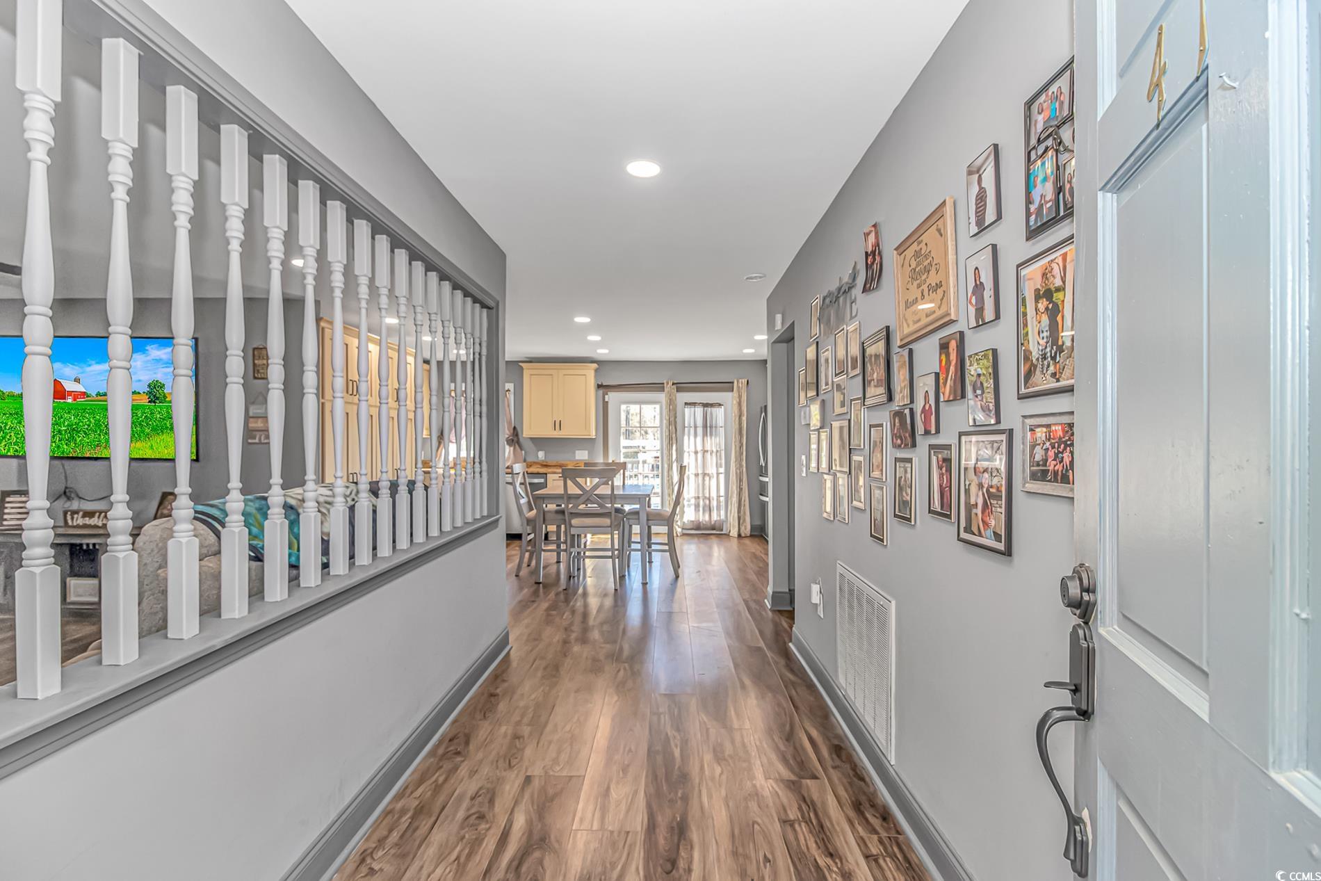 4106 Edwards Road Aynor, SC 29511 - Photo 3 of 39 Corridor featuring dark hardwood / wood-style floo