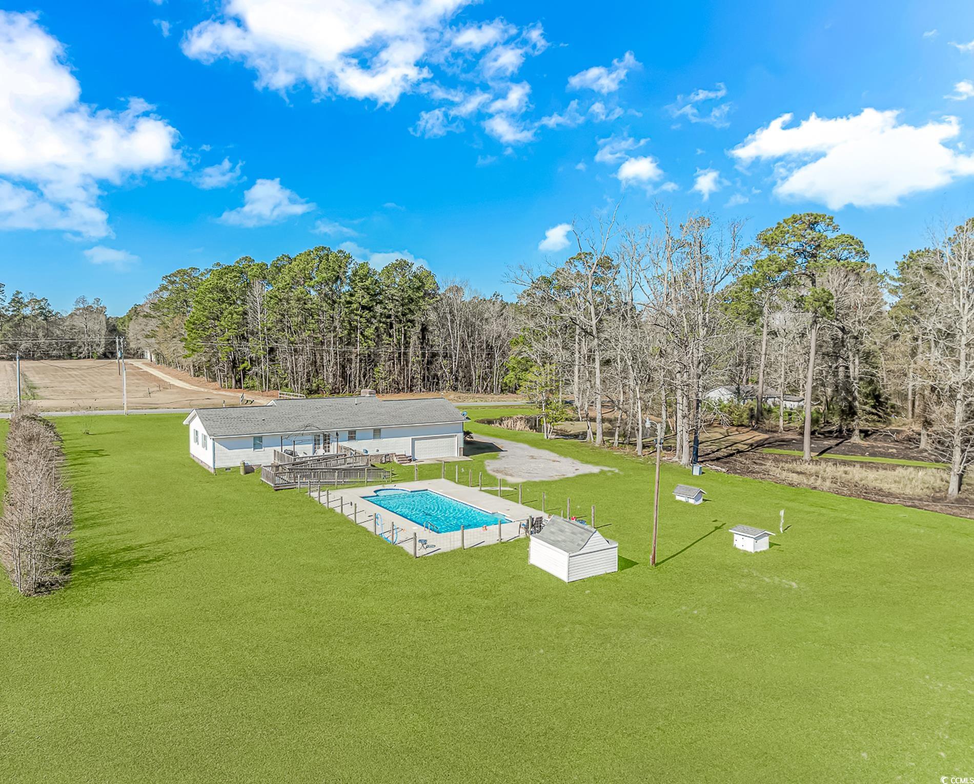 4106 Edwards Road Aynor, SC 29511 - Photo 37 of 39 View of pool featuring a yard
