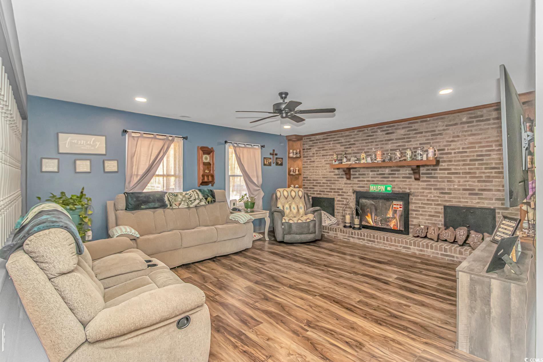 4106 Edwards Road Aynor, SC 29511 - Photo 5 of 39 Living room featuring ceiling fan, hardwood / wood