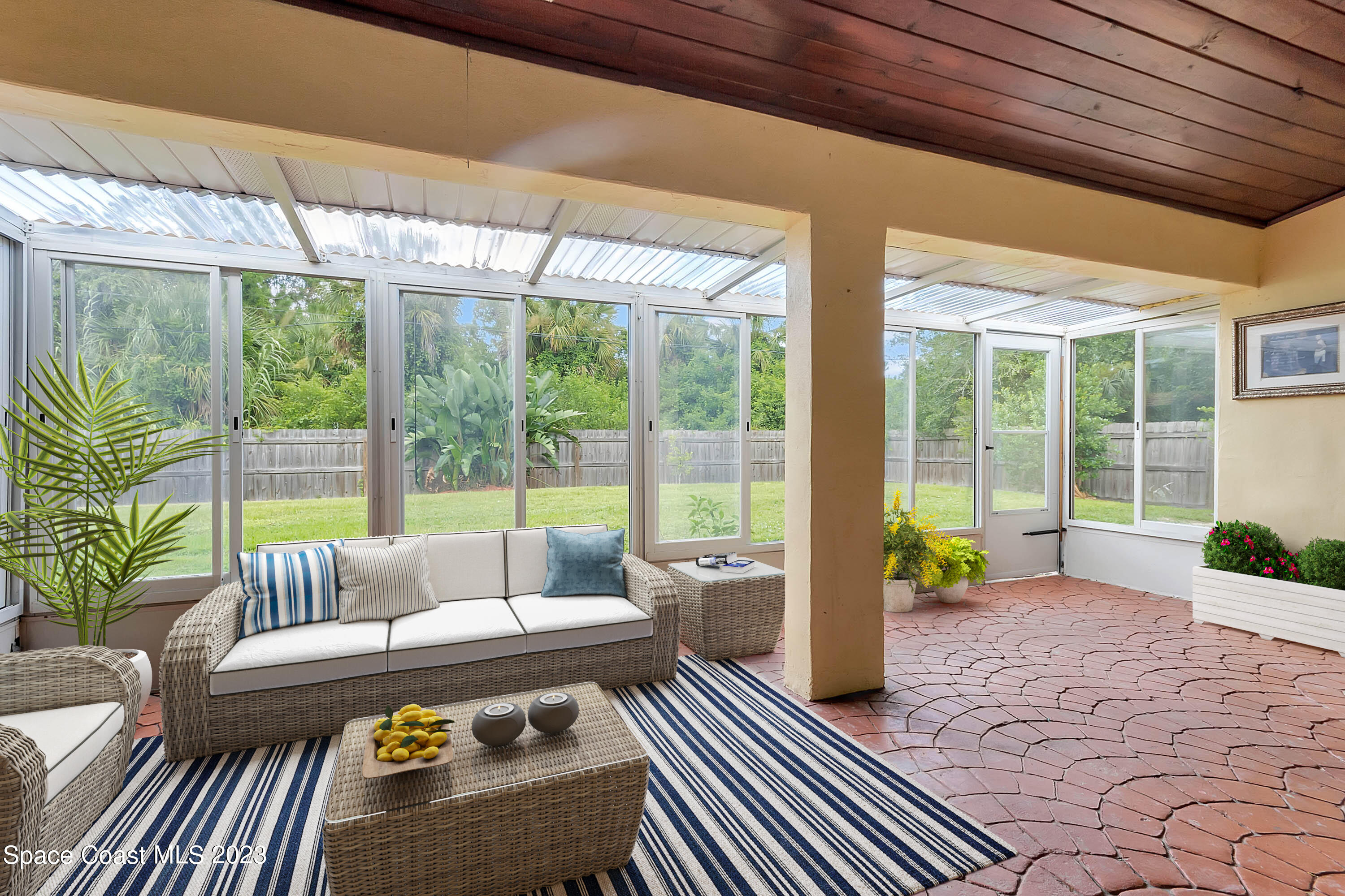 1141 Wing Road Southwest Palm Bay, FL 32908 - Photo 10 of 12 Staged Florida Room
