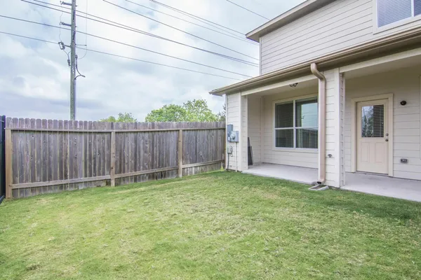 a view of a backyard with a garden
