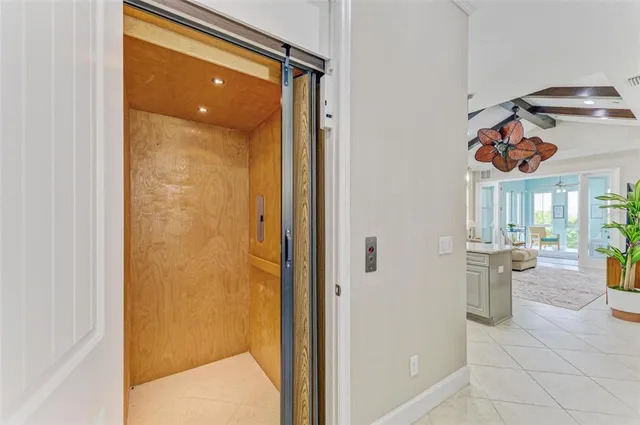 an aerial view of a house with a swimming pool yard and outdoor seating