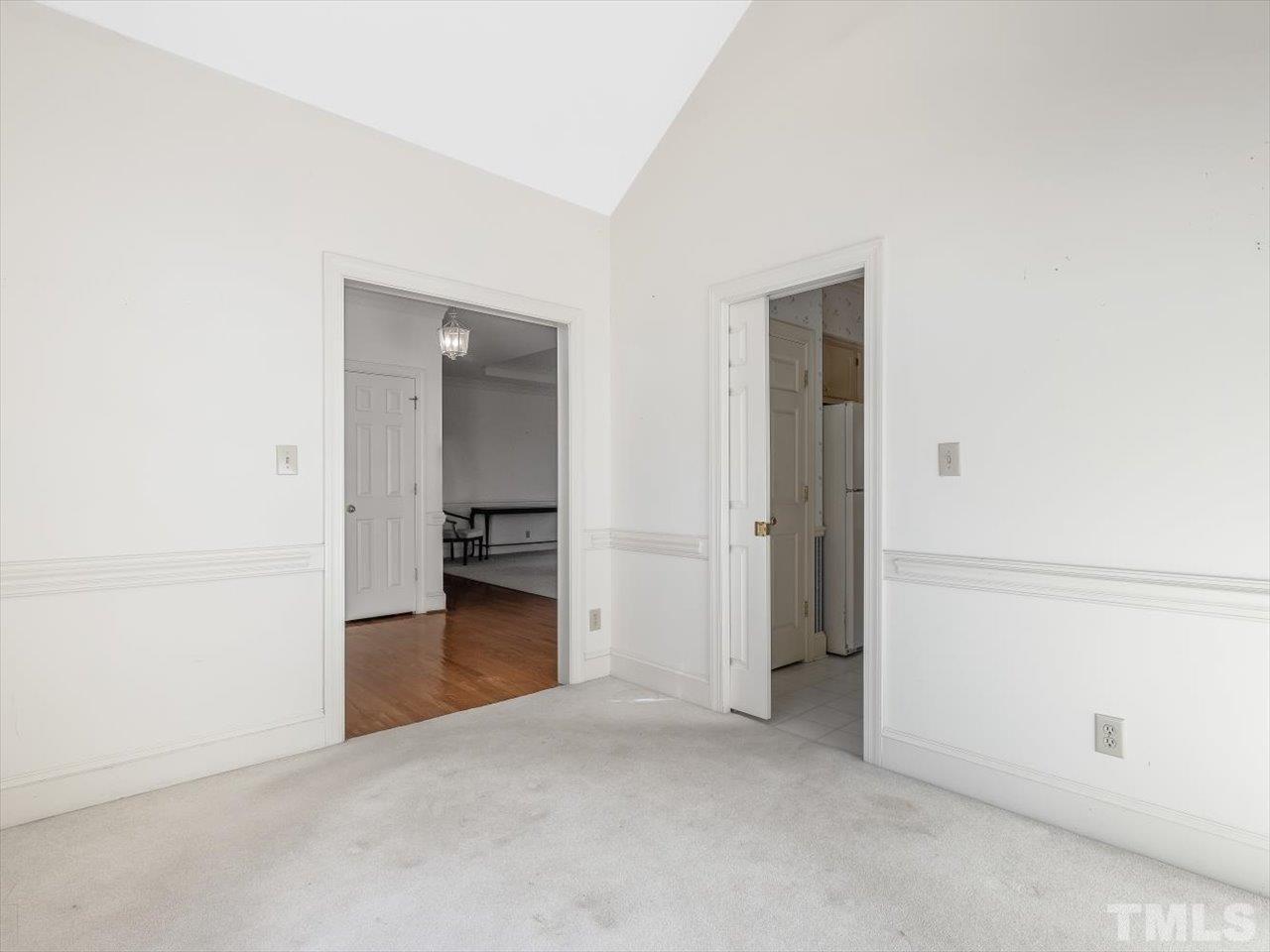 2016 Carrbridge Way Raleigh, NC 27615 - Photo 11 of 53 an empty room with closet and a bathroom
