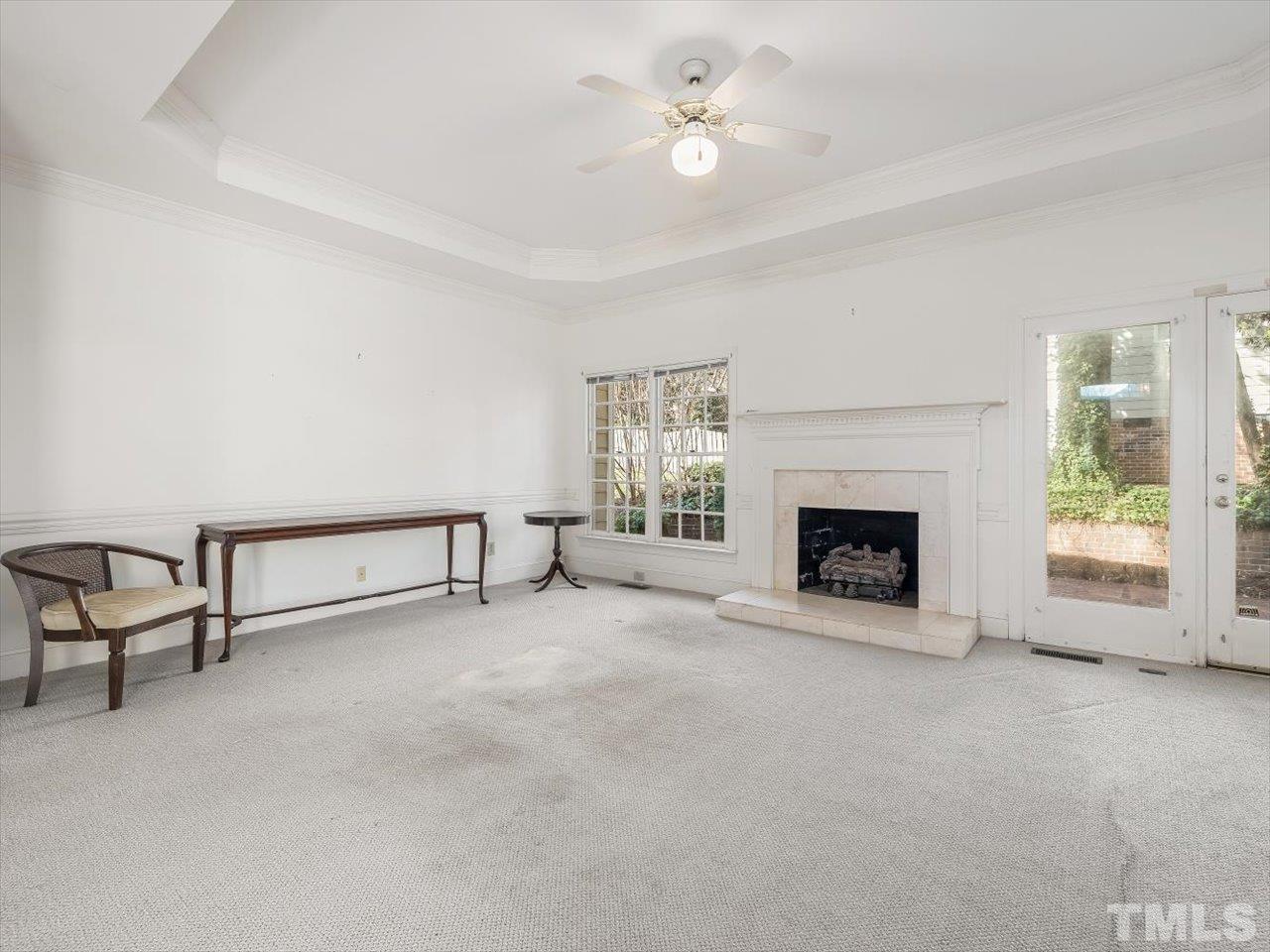 2016 Carrbridge Way Raleigh, NC 27615 - Photo 12 of 53 a view of livingroom with furniture fireplace and window