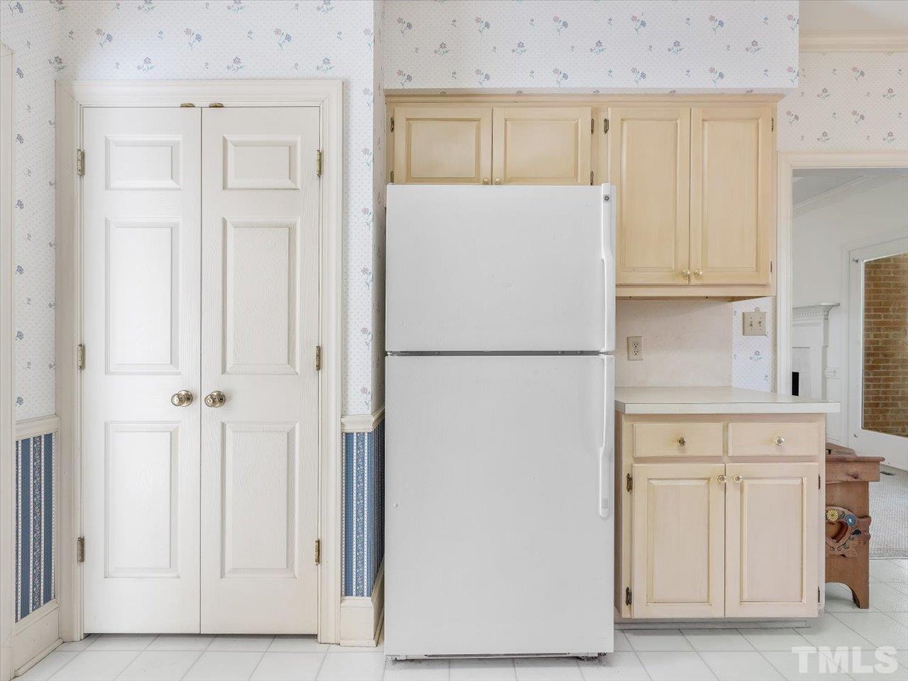 2016 Carrbridge Way Raleigh, NC 27615 - Photo 20 of 53 a white refrigerator freezer sitting in a kitchen