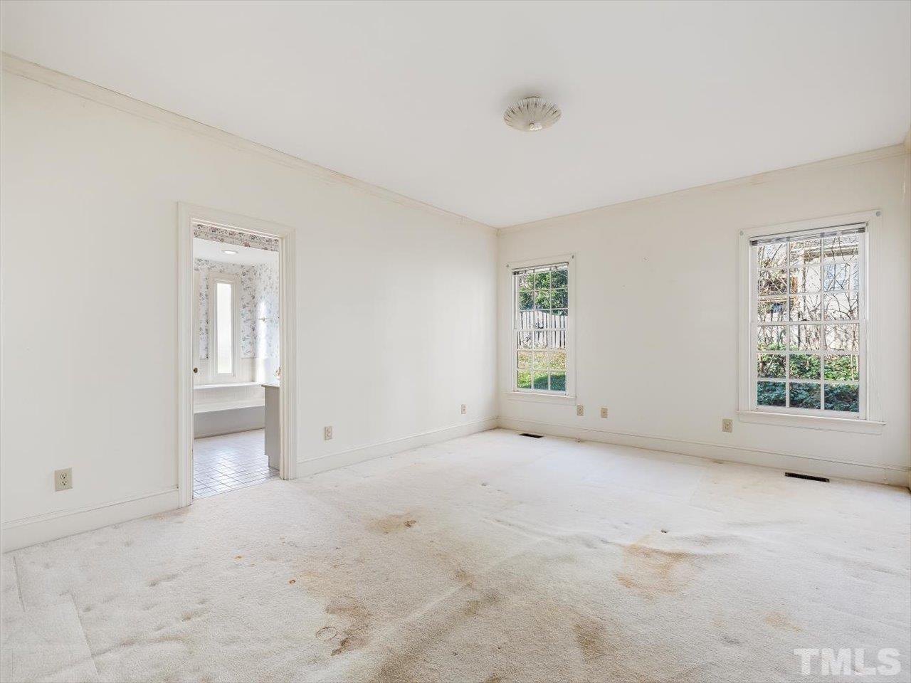 2016 Carrbridge Way Raleigh, NC 27615 - Photo 23 of 53 an empty room with windows and closet