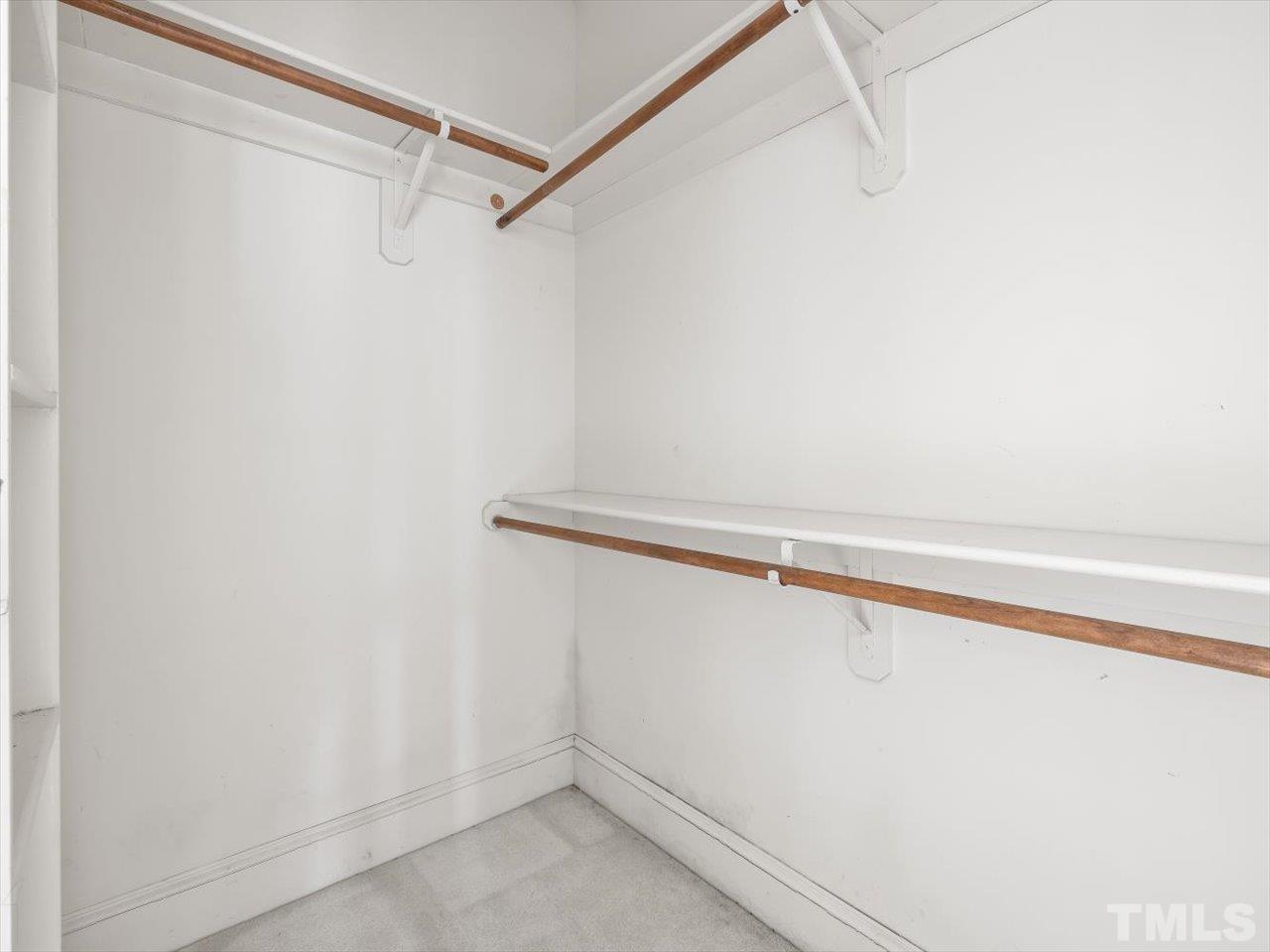 2016 Carrbridge Way Raleigh, NC 27615 - Photo 29 of 53 a view of a room with racks on the wall