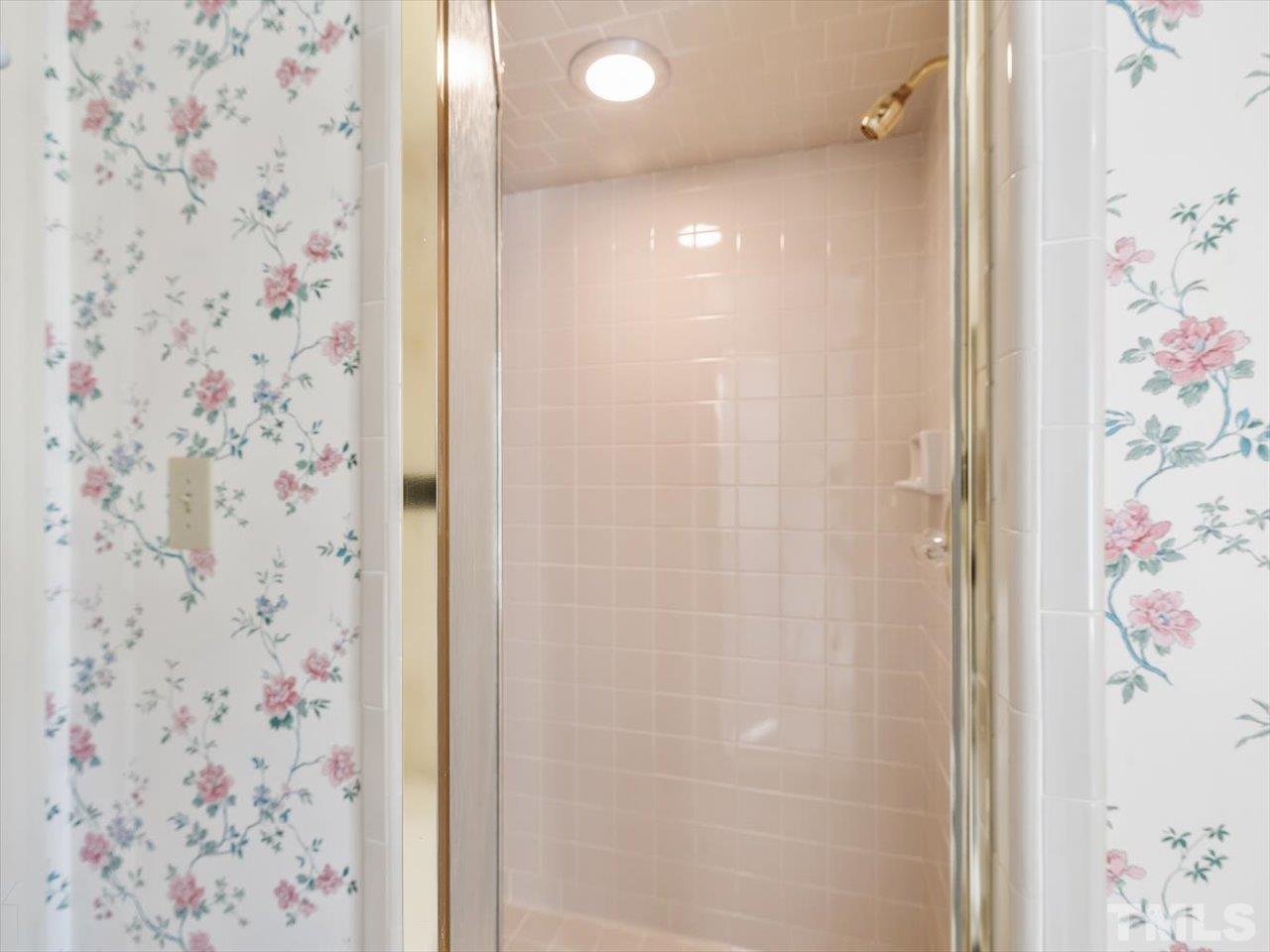 2016 Carrbridge Way Raleigh, NC 27615 - Photo 30 of 53 a bathroom with a shower curtain