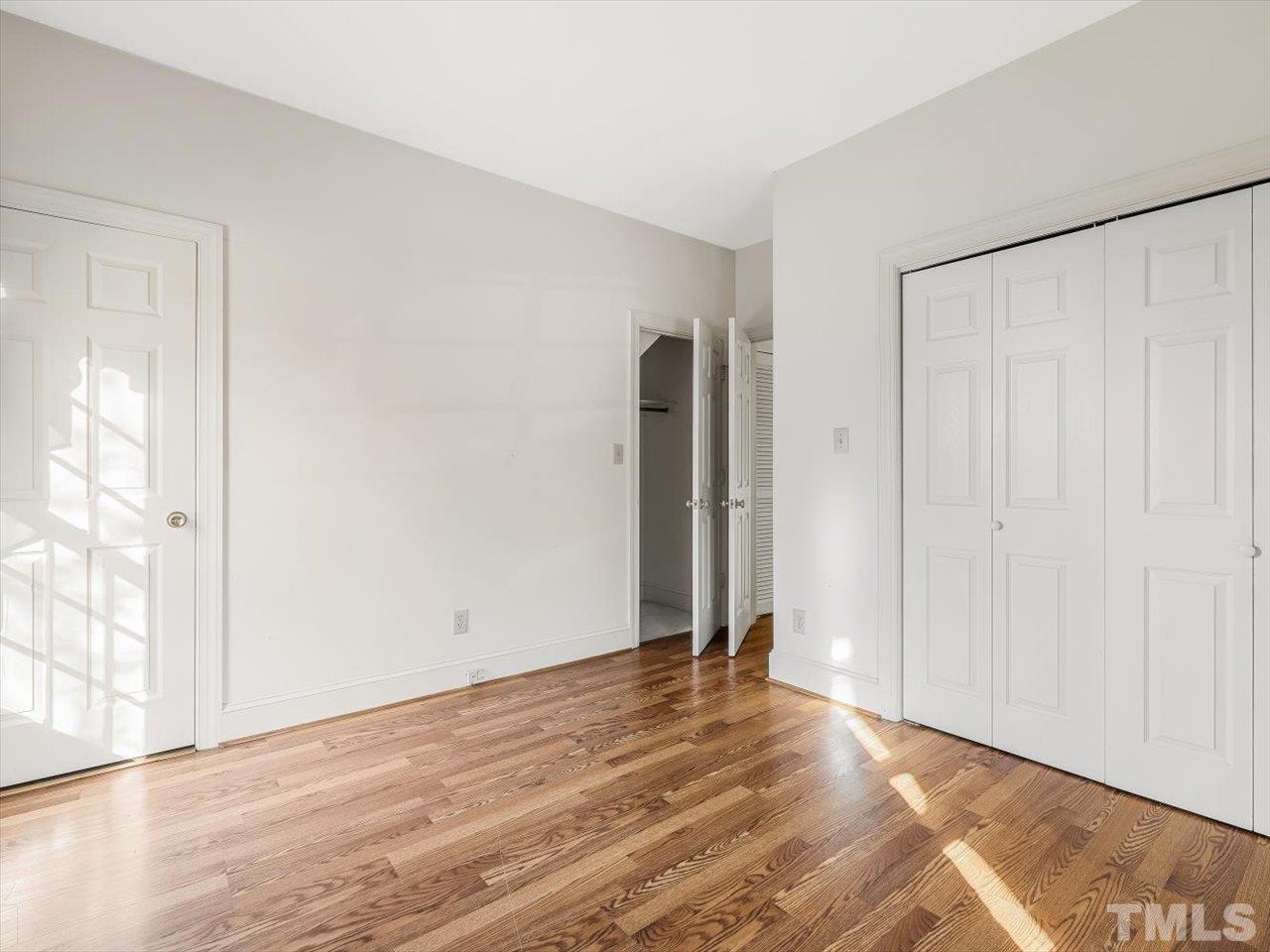 2016 Carrbridge Way Raleigh, NC 27615 - Photo 35 of 53 a view of an empty room with wooden floor