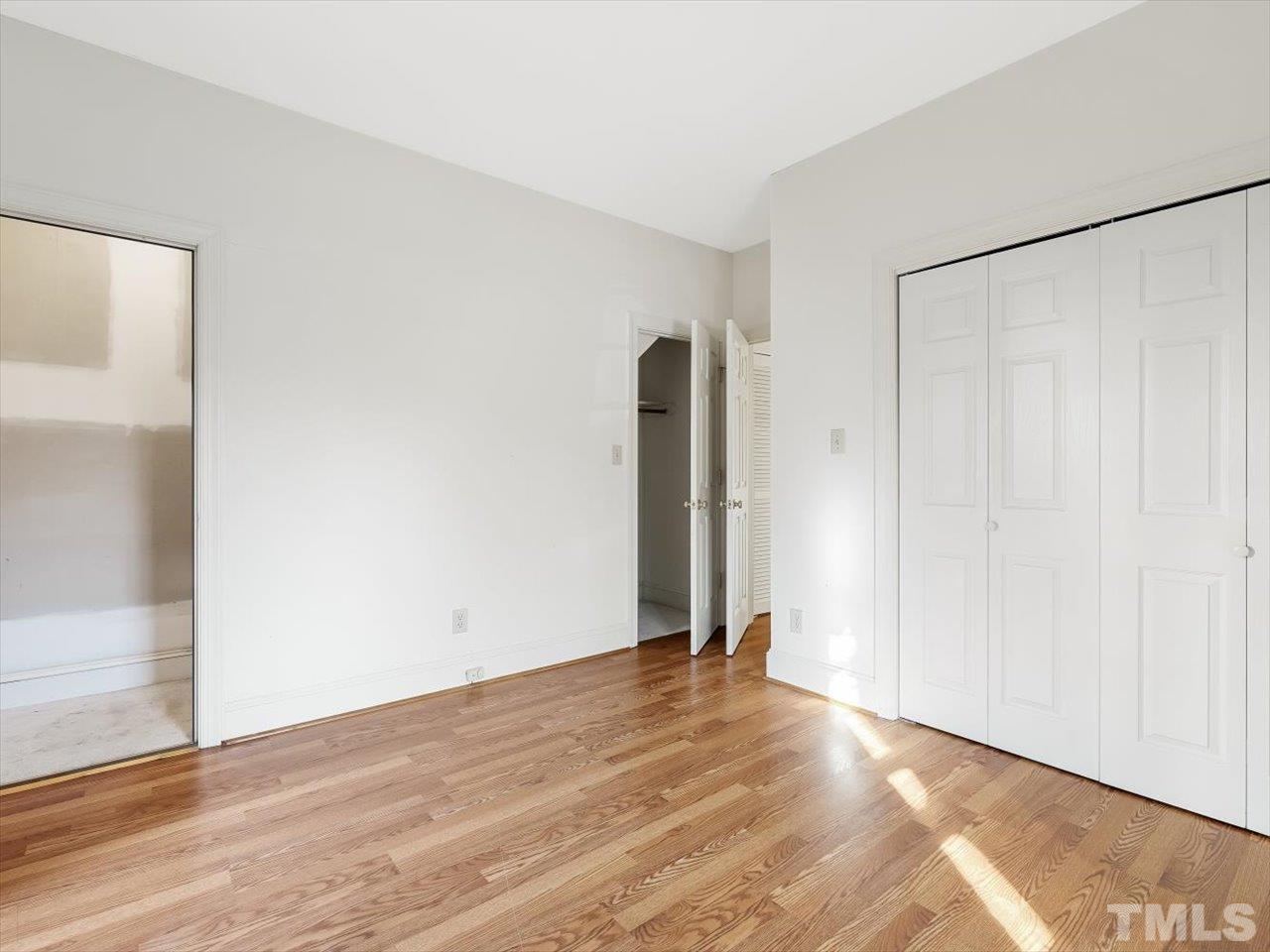 2016 Carrbridge Way Raleigh, NC 27615 - Photo 36 of 53 a view of an empty room with wooden floor