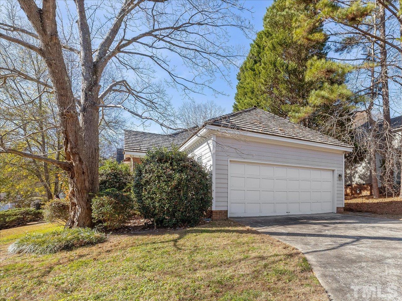 2016 Carrbridge Way Raleigh, NC 27615 - Photo 42 of 53 a front view of a house with a yard