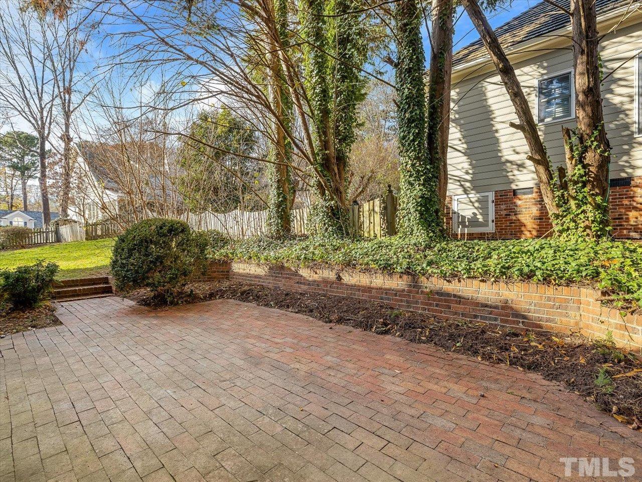 2016 Carrbridge Way Raleigh, NC 27615 - Photo 47 of 53 a view of a backyard with large trees