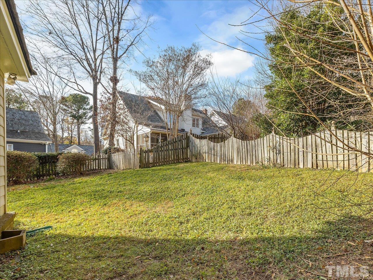 2016 Carrbridge Way Raleigh, NC 27615 - Photo 51 of 53 a view of a garden with a house