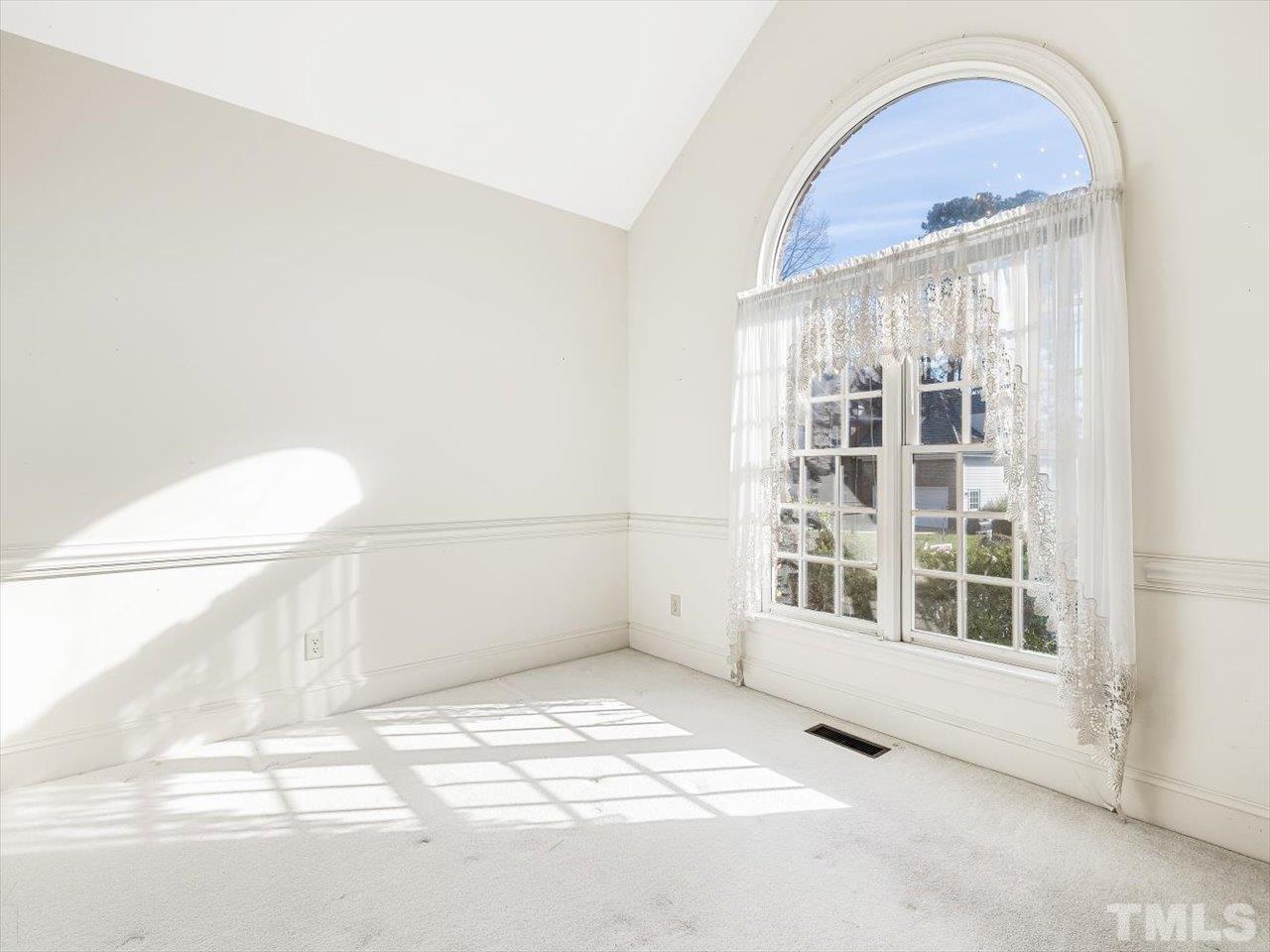 2016 Carrbridge Way Raleigh, NC 27615 - Photo 9 of 53 a view of an empty room with a window