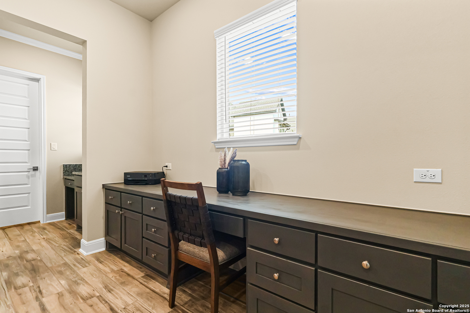 27103 Coltons Canyon San Antonio, TX 78260 - Photo 15 of 42 a view of a workspace with furniture and window