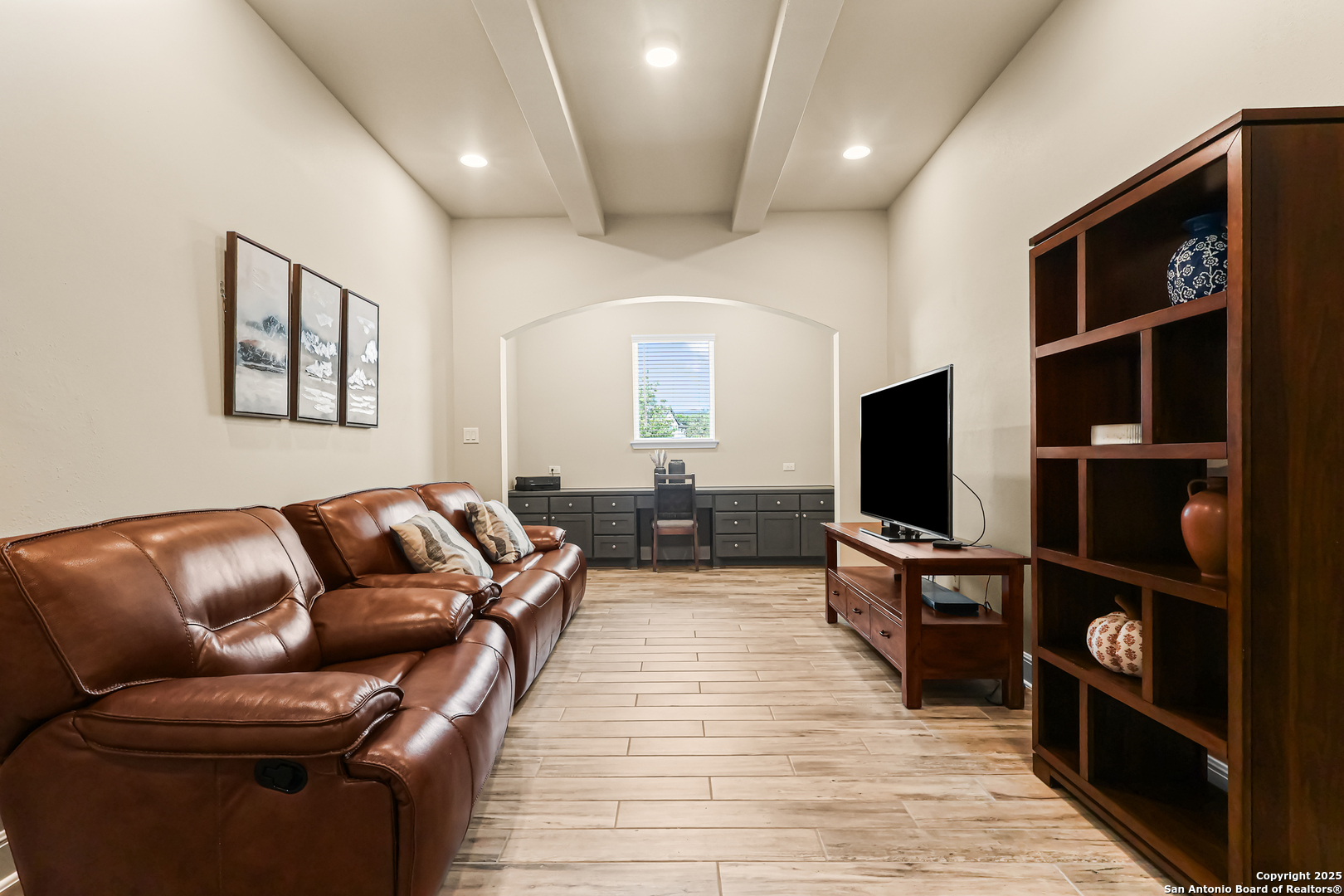 27103 Coltons Canyon San Antonio, TX 78260 - Photo 17 of 42 a living room with furniture and a flat screen tv