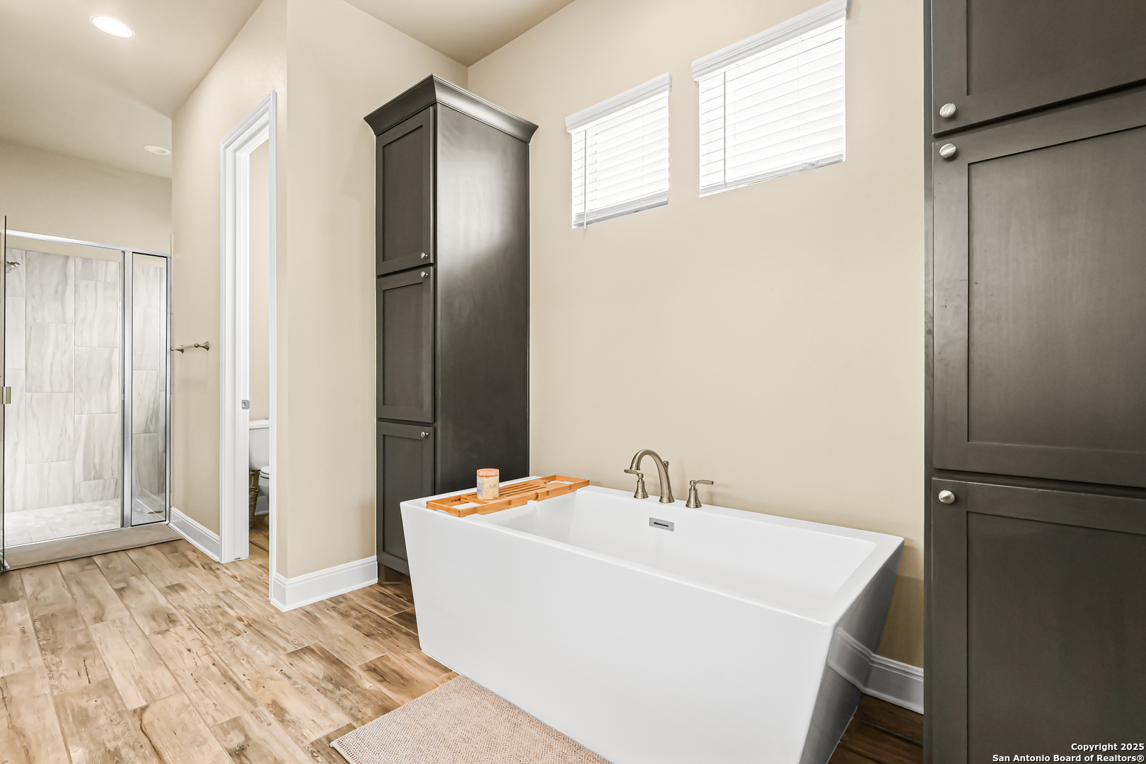 27103 Coltons Canyon San Antonio, TX 78260 - Photo 23 of 42 a bathroom with a sink and a mirror