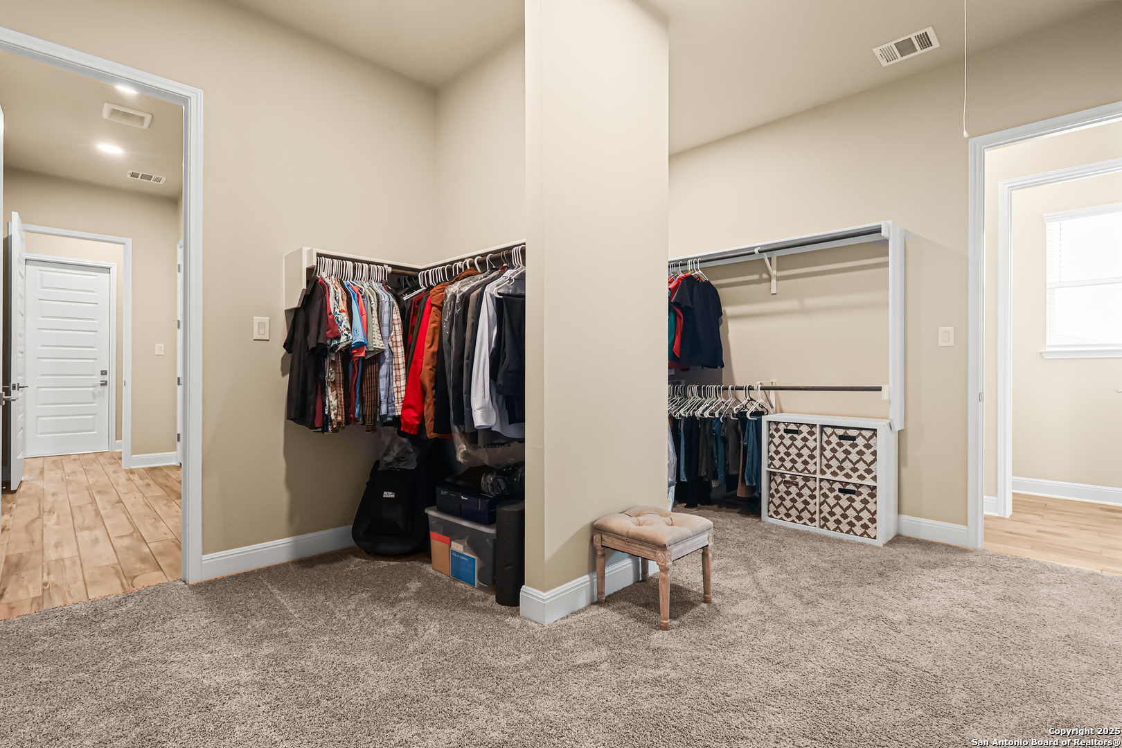 27103 Coltons Canyon San Antonio, TX 78260 - Photo 27 of 42 a view of walk in closet with clothes and shoes