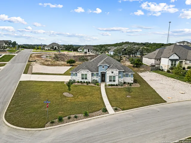swimming pool view with a lake view