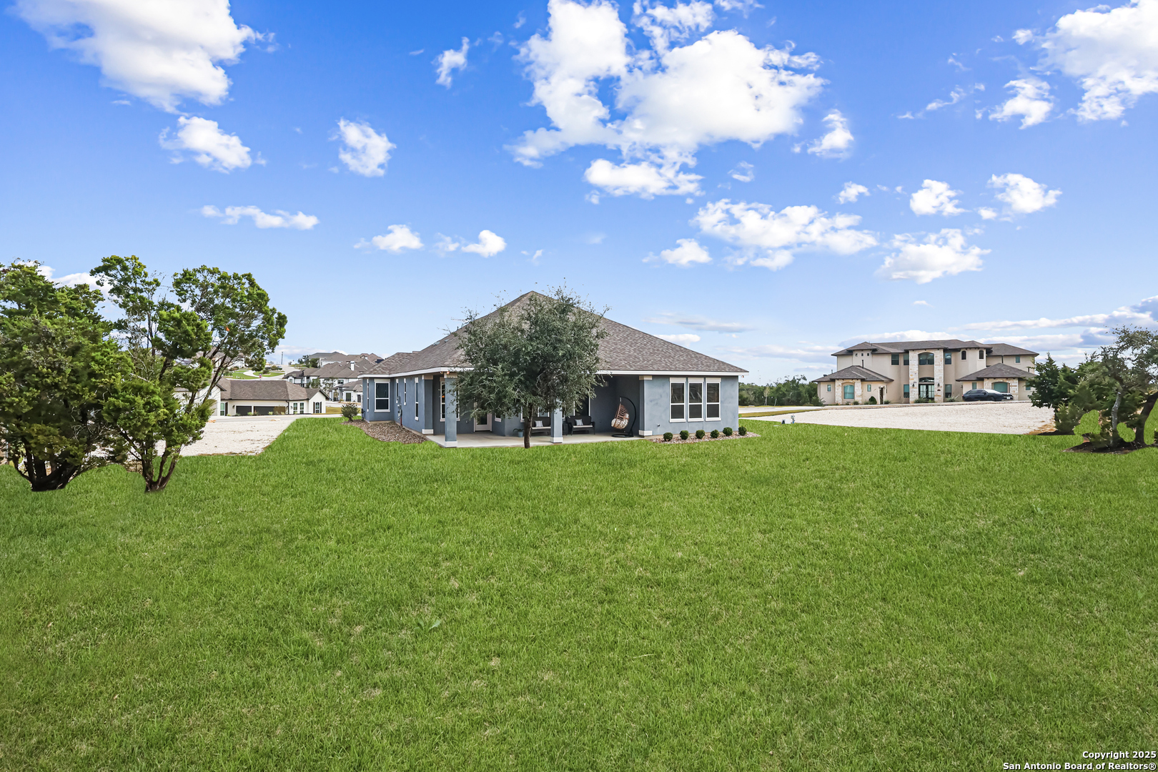 27103 Coltons Canyon San Antonio, TX 78260 - Photo 36 of 42 a front view of a house with garden