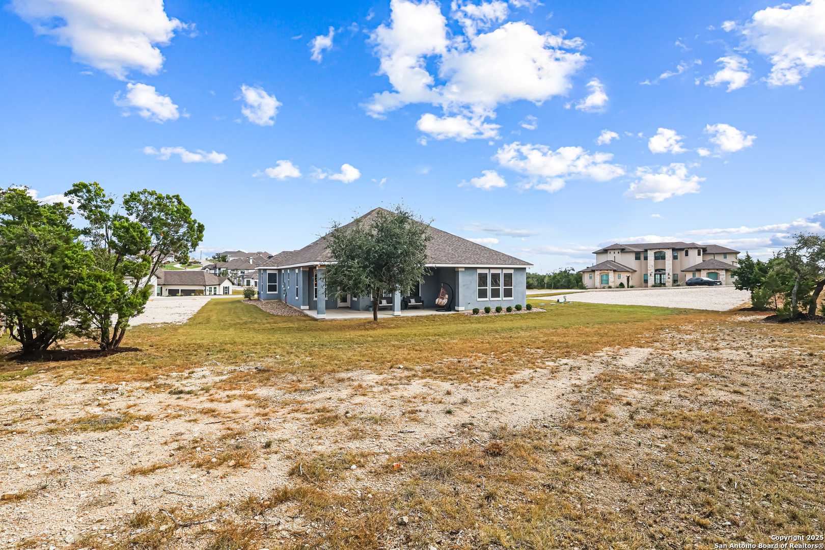 27103 Coltons Canyon San Antonio, TX 78260 - Photo 37 of 42 a view of house with outdoor space and swimming pool