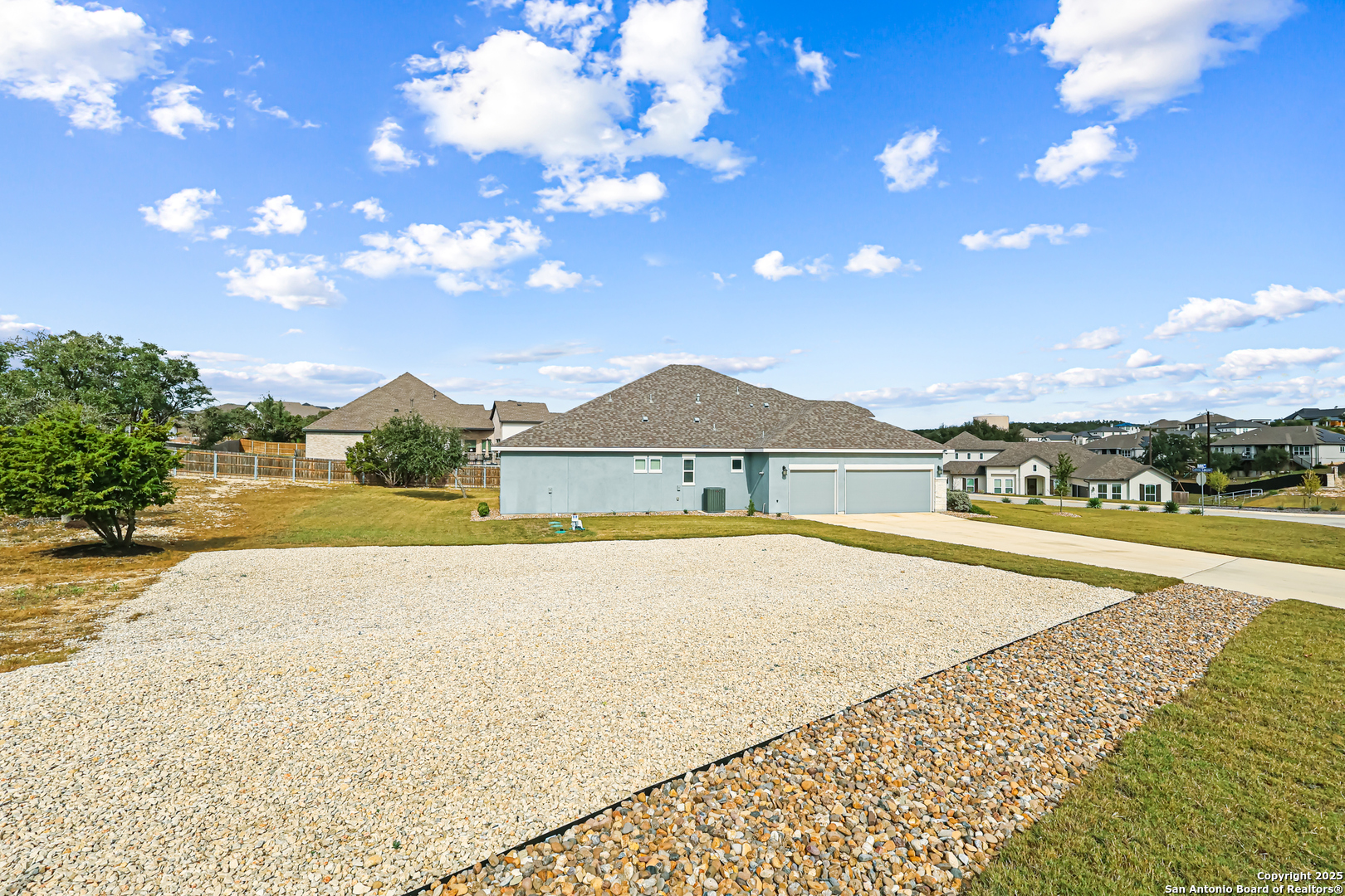 27103 Coltons Canyon San Antonio, TX 78260 - Photo 6 of 42 a view of an house with swimming pool and mountains in the background