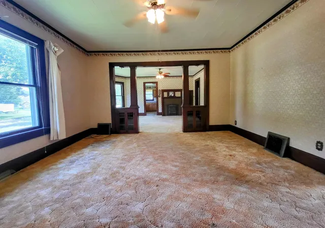 an empty room with windows