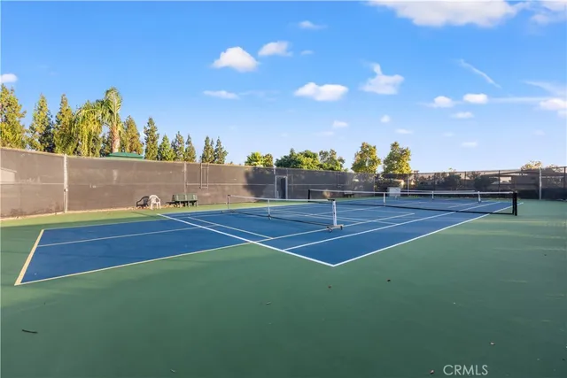 a view of a backyard with sitting area