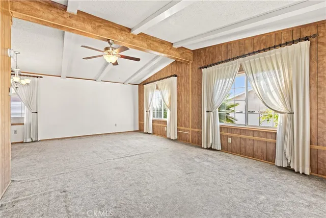 a view of a bathroom with a tub and shower doors