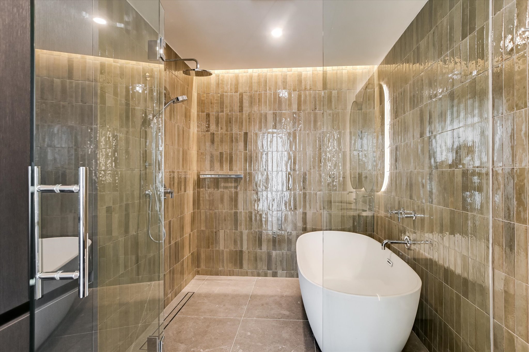 610 Davis Street, Unit 3801 Austin, TX 78701 - Photo 19 of 40 a bathroom with a bathtub and shower
