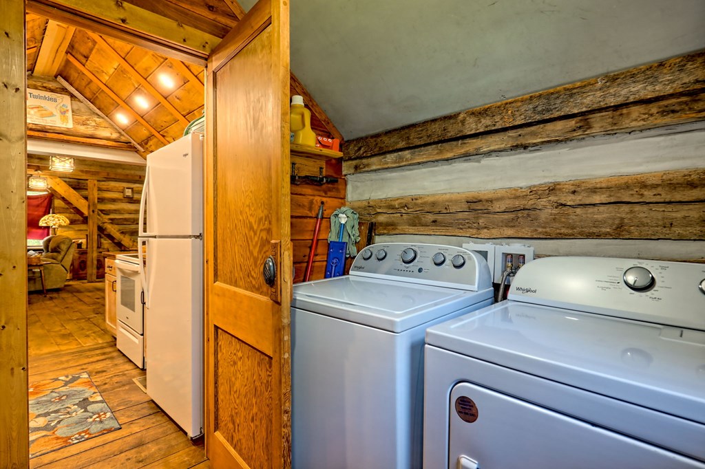 1064 Muskrat Creek Road Hayesville, NC 28904 - Photo 15 of 67 a utility room with dryer and washer