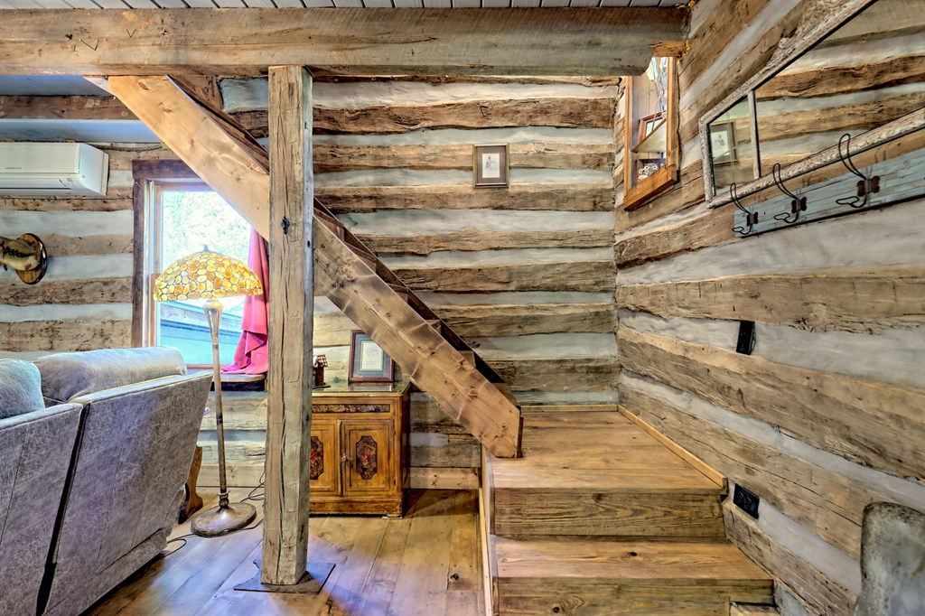 1064 Muskrat Creek Road Hayesville, NC 28904 - Photo 28 of 67 a view of entryway with wooden floor