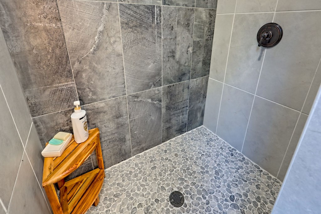 1064 Muskrat Creek Road Hayesville, NC 28904 - Photo 32 of 67 a bathroom with a sink
