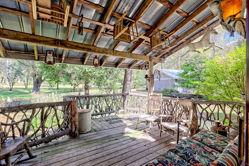1064 Muskrat Creek Road Hayesville, NC 28904 - Photo 35 of 67 a balcony with wooden floor