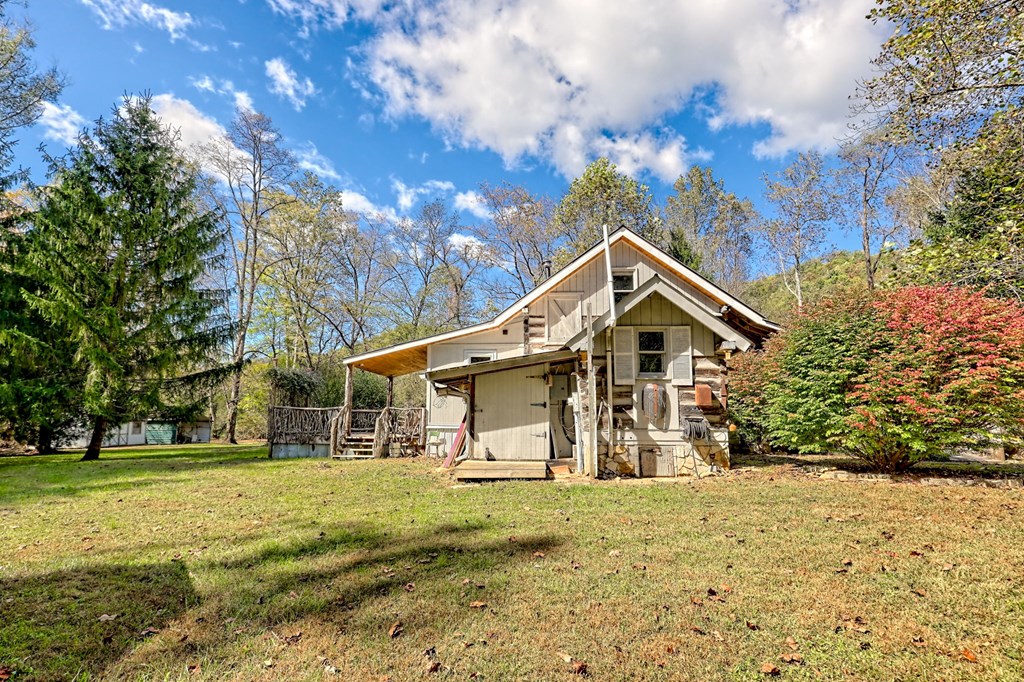 1064 Muskrat Creek Road Hayesville, NC 28904 - Photo 38 of 67 a front view of a house with a yard