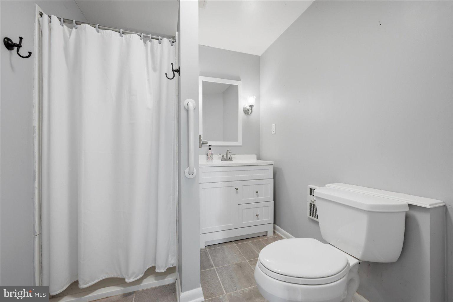 165 Wilson Burke Road Front Royal, VA 22630 - Photo 47 of 134 a bathroom with a granite countertop toilet and a sink