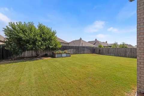 a swimming pool with wooden fence