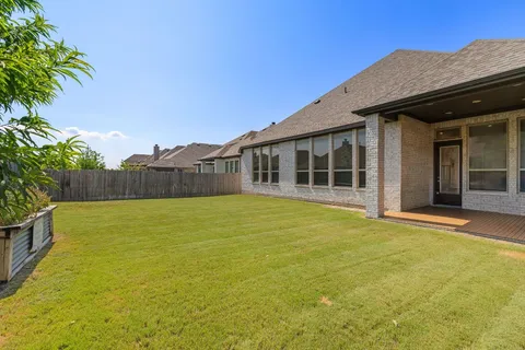 a view of a house with a swimming pool